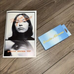 Gracie Abrams lyric book and camera from her tour.